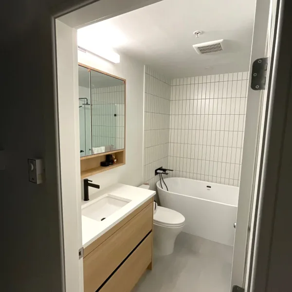 Before and after bathroom renovation, West 4th, Vancouver